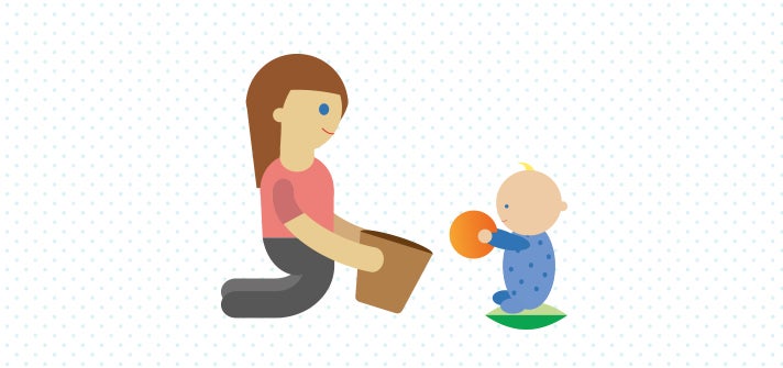 Mum and baby playing ball games together