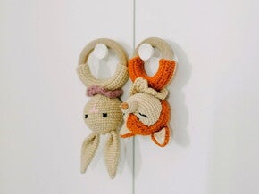 Baby wooden teething toy rabbit and fox hanging on hooks Baby wooden teething toy rabbit and fox hanging on hooks