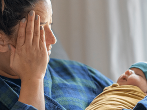 mum with baby looks tired mum with baby looks tired