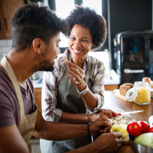 woman and man eating in the kitchen