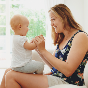mother and baby sitting together on lounge