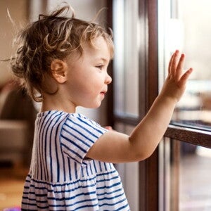 toddler looking out the window toddler looking out the window