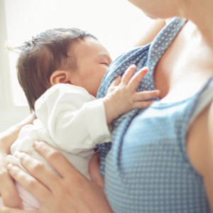Mother breastfeeding infant
