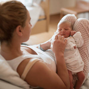 Mother with newborn baby after c-section