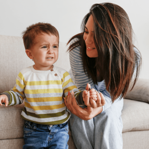 Emotional Regulation skills mom holding toddler hand