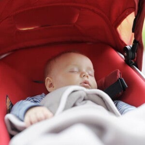 Baby sleeping in a pram Baby sleeping in a pram