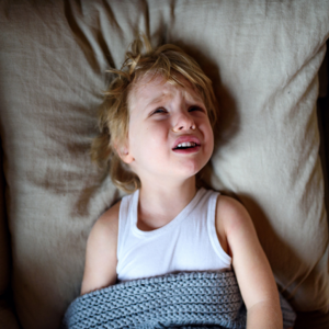 upset child in bed