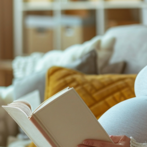 Pregnant lady reading a book Pregnant lady reading a book