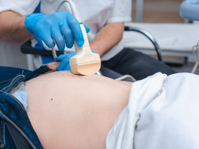 pregnant woman getting an ultrasound pregnant woman getting an ultrasound