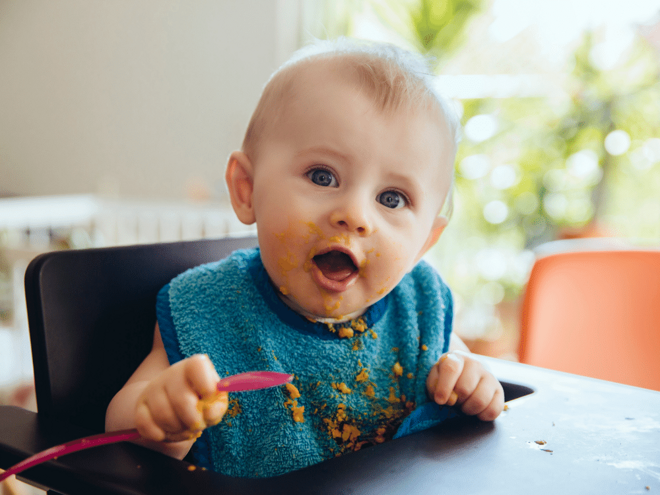 young baby spoon food puree green bib young baby spoon food puree green bib