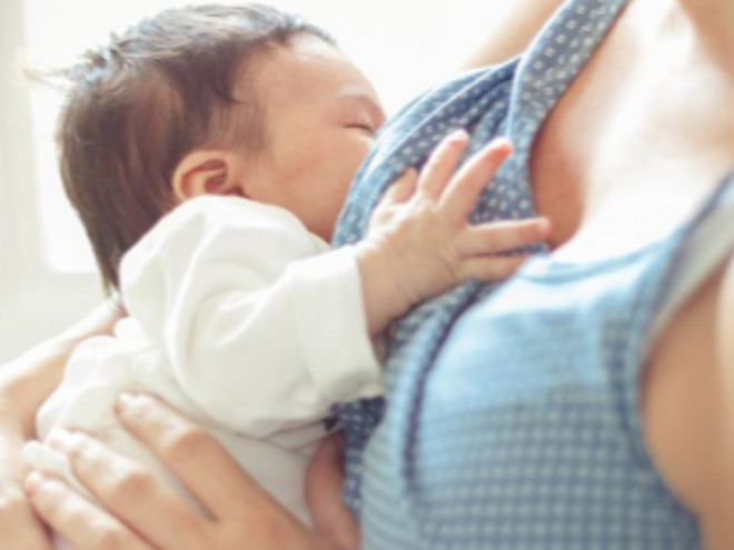 Mother breastfeeding infant
