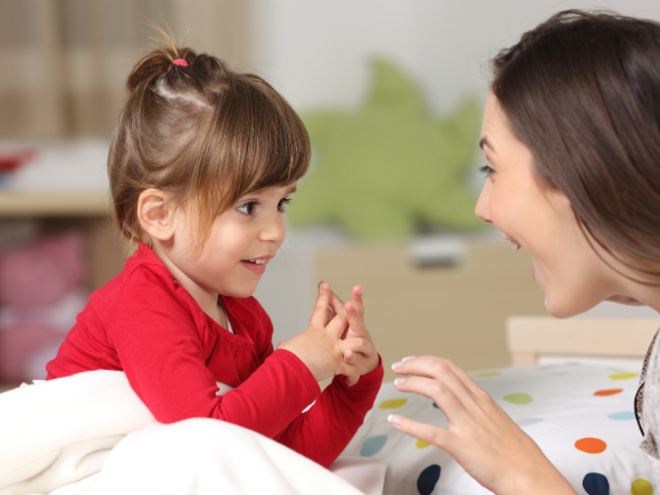 Toddler girl talking to her mother Toddler girl talking to her mother